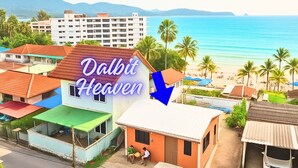 A residential area with a prominent building labeled "Dalbit Heaven" featuring a red roof, a green awning, and a small porch. - 3-Min Walk to Beach • Super Private 2 BR House (Tambon Patong)