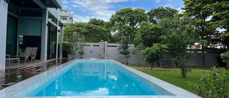Outdoor pool, open 9:00 AM to 6:00 PM, pool umbrellas, sun loungers