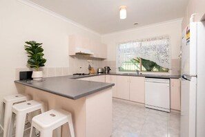 Fridge, microwave, oven, dishwasher - Rye 3BR Beach House • 300m to Beach • Family‑Friendly with Backyard & BBQ (Rye)