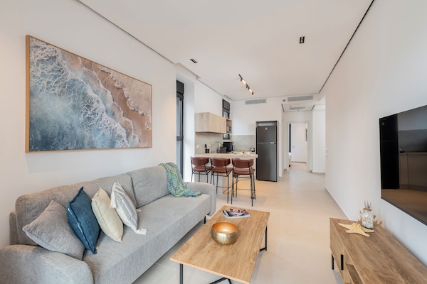 Family Apartment, 2 Bedrooms, Balcony, City View | Living area | Flat-screen TV