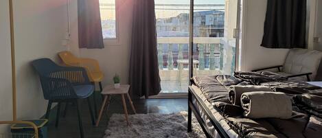 Deluxe Single Room, 1 King Bed, Balcony, City View | WiFi (free), bed sheets