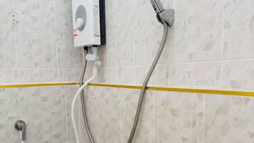 City Townhome, Non Smoking | Bathroom | Shower, towels, soap, shampoo