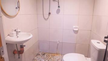 Triple Room, Balcony | Bathroom | Shower, hair dryer, soap, shampoo