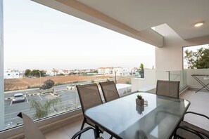 Outdoor dining - First Floor apartment with communal pool close to bars and restaurants (Kapparis)