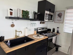 Fridge, microwave, oven, stovetop - A beautiful one bedroom apartment in Carolina Puerto Rico, La Villa, Encanto (Carolina)