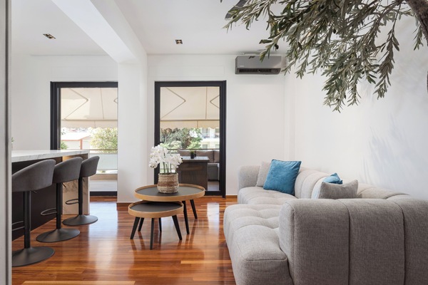 Family Suite, Balcony | Living area | 45-inch Smart TV with satellite channels, Netflix, streaming services