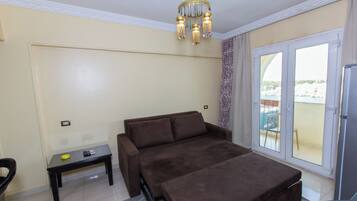 Suite estudio Deluxe | Zona de estar