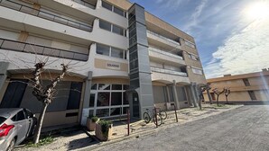 A multi-story building with the name "SOLAREN" on the facade. - Air-Conditioned 3-Room Apartment with Terrace, Close to Beach (Port-la-Nouvelle)