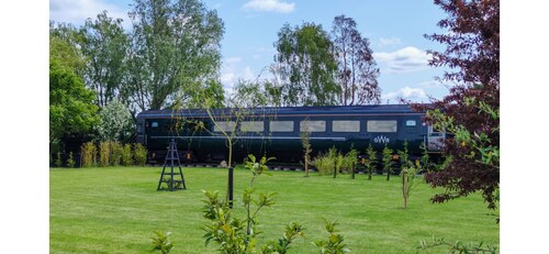 Railway train carriage beautifully converted for an unusual stay in Countryside