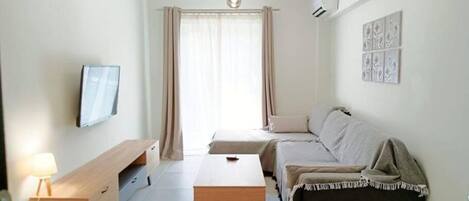 Marousi Harmony Home | Living area | 50-cm flat-screen TV with digital channels