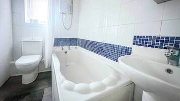 Hair dryer, towels, soap, toilet paper