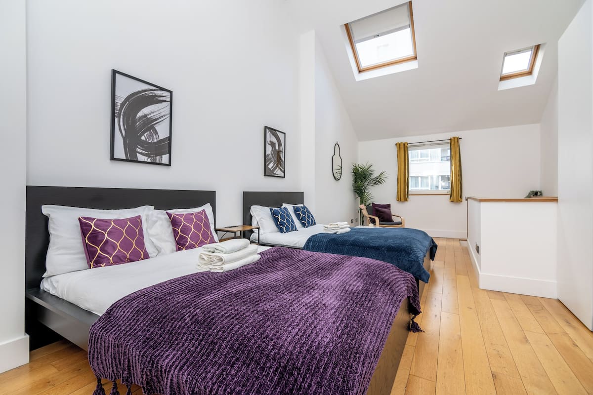 Desk, laptop workspace, blackout curtains, iron/ironing board