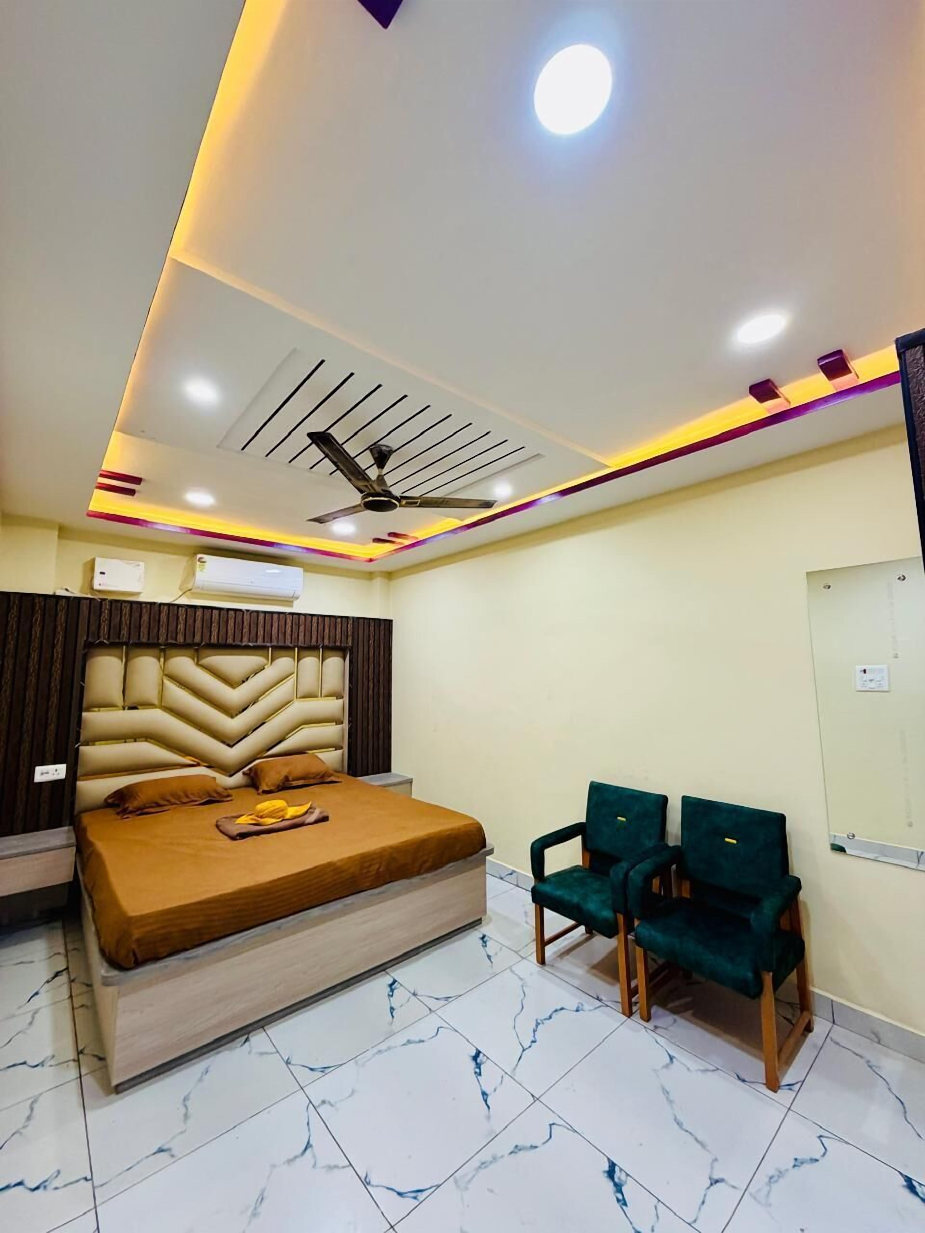 Habitación Deluxe | Camas supletorias, wifi gratis, ropa de cama