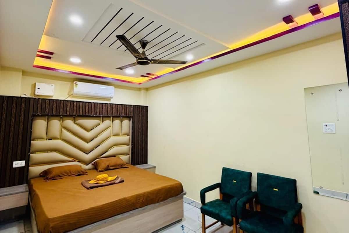 Habitación Deluxe | Camas supletorias, wifi gratis, ropa de cama