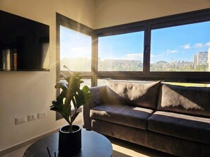 TV, offices - Sacher Park #New 1BR w/ Balcony | By SweetyGuest (Jerusalem)