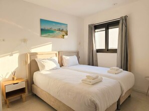 3 habitaciones, tabla de planchar con plancha, cuna de viaje y wifi 