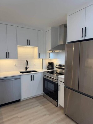 Fridge, microwave, oven, stovetop - Modern 2BR Getaway Near Revere Beach (Revere)