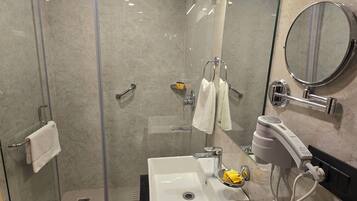 Shower, free toiletries, hair dryer, slippers