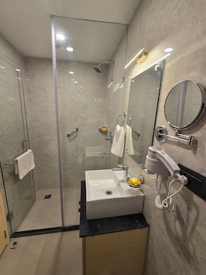 Shower, free toiletries, hair dryer, slippers