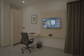 Premium Room | Living area | 32-inch flat-screen TV with digital channels - Comfort Inn Braj (Mathura)