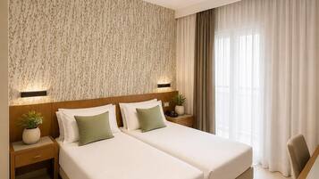 Standard Twin Room, Non Smoking, Private Bathroom | In-room safe, desk, laptop workspace, blackout drapes