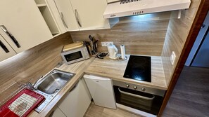 Apartamento | Cozinha privada | Cadeirão de bebê