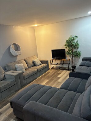 Living area - Soothing 2-bedroom house with AC in charming 3 mins from Dearborn Hts (Inkster)