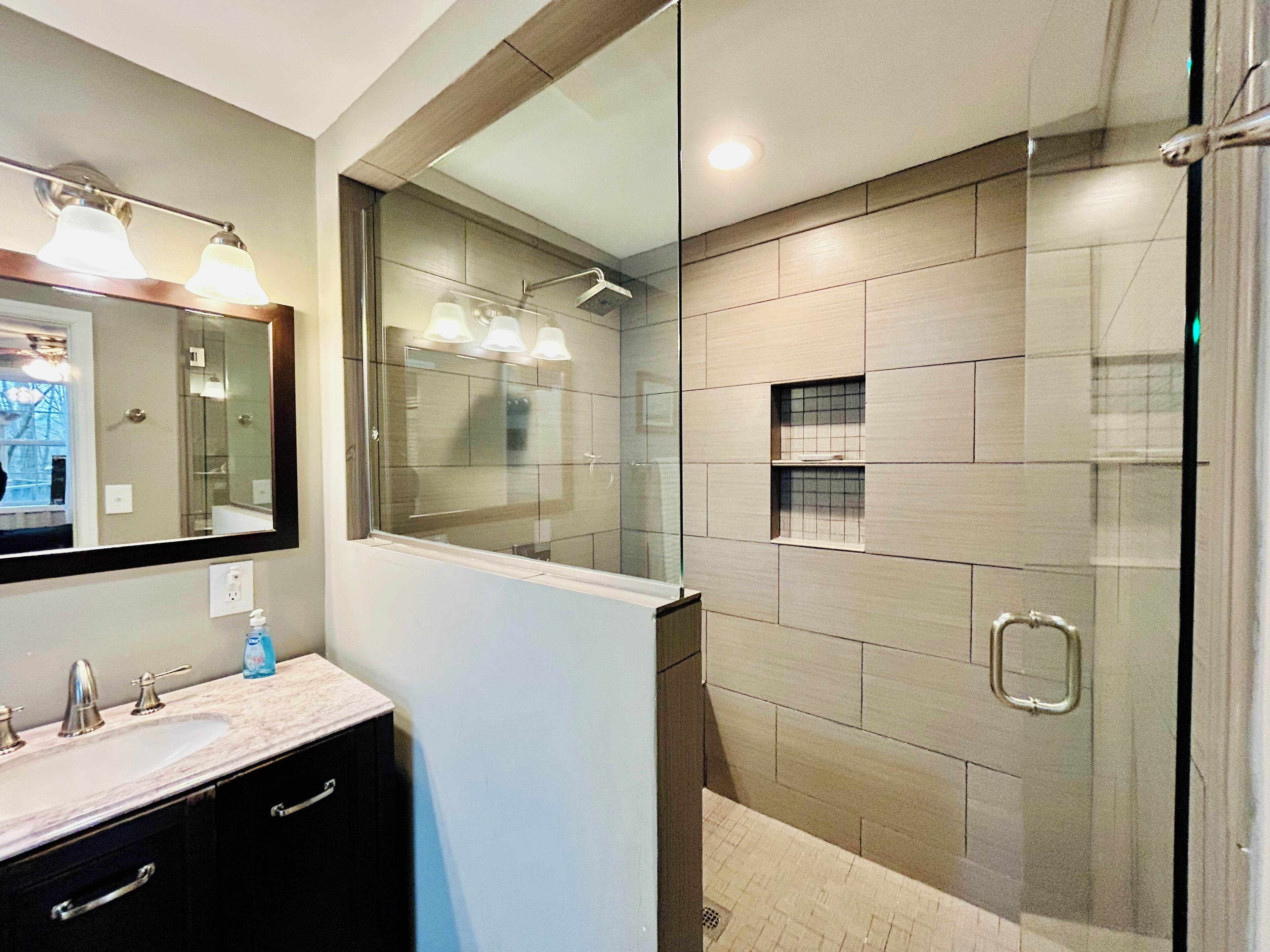 Shower, hair dryer, towels, toilet paper