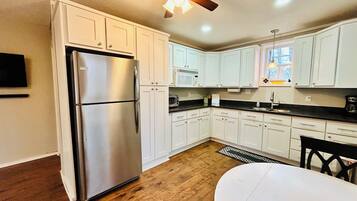 Fridge, microwave, dishwasher, coffee/tea maker