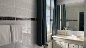 Hair dryer, towels, soap, shampoo