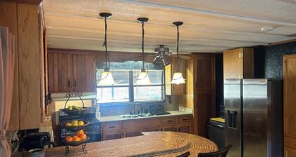 Charming 3-bedroom house in beautiful Georgiana with AC on 18 acres with pond