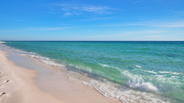 A beach with clear turquoise water and a sandy shore. - Golf Cart Perks, Large Private Pool, Close to Beach (Santa Rosa Beach)