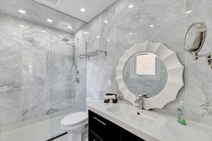 Shower, hair dryer, towels, soap