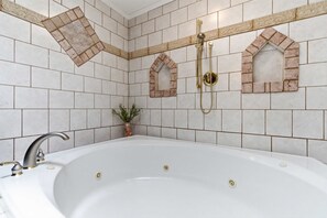 Shower, hair dryer, towels, shampoo
