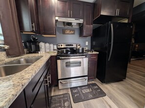 Microwave, oven, stovetop, coffee/tea maker - Entertainment Haven | Spacious 4BR Atlanta Stay (Atlanta)