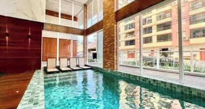 Apartment with safety netting, heated pool, and gym.