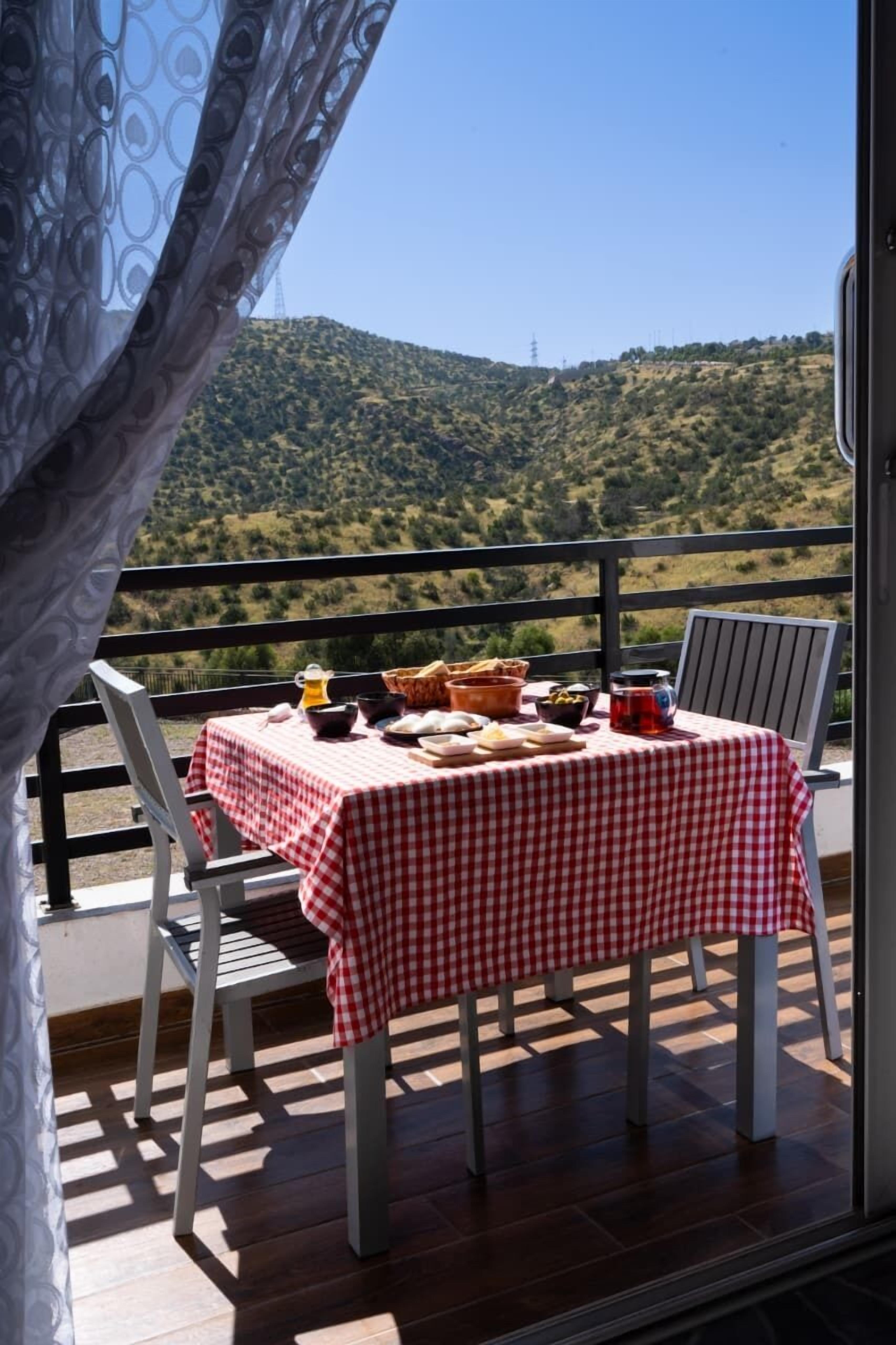 Deluxe Double Room, Balcony, Mountain View | In-room dining
