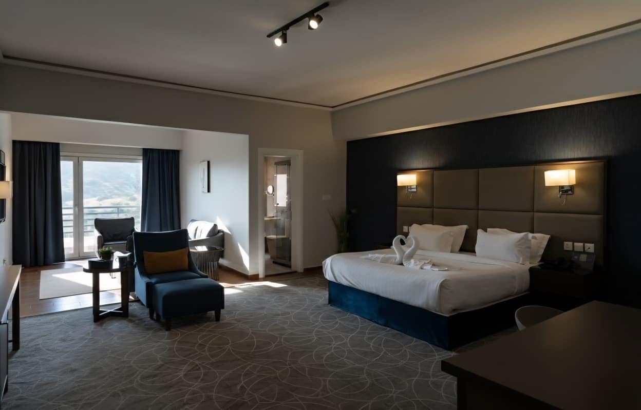 Deluxe Double Room, Balcony, Mountain View | In-room safe, blackout drapes, soundproofing, iron/ironing board