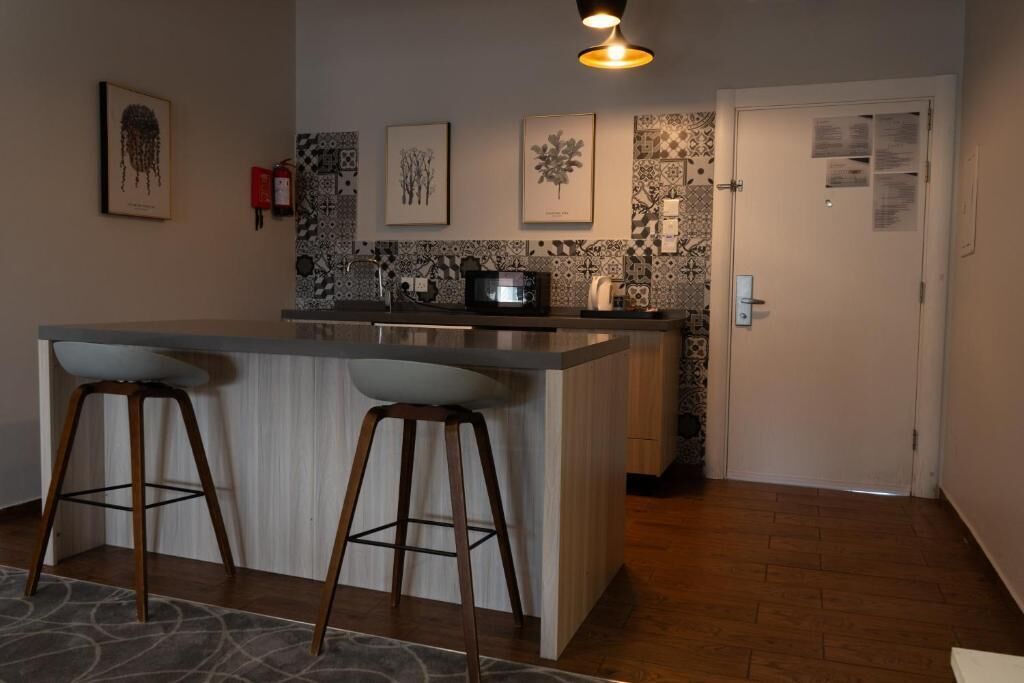 Quarto casal luxo, sacada, vista para a montanha | Cozinha privada | Geladeira, micro-ondas