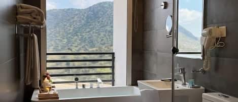 Deluxe Double Room, Balcony, Mountain View | Bathroom | Combined shower/bathtub, hair dryer, slippers, towels
