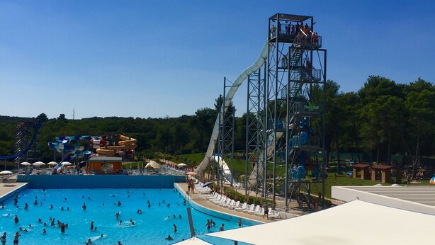 A water park with a large pool, a tall water slide, and a viewing platform. - Luxury 5 Bed, 7 Bath, Villa. Pool, Gym, Sauna, Hottub, Parking, 2 terr w/Seaview (Jursici)