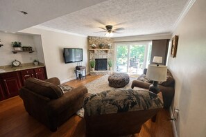 TV, books - Creekside Condo with Pool, Walk Downtown (Gatlinburg)