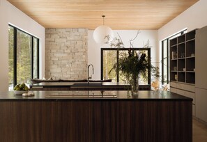 Fridge, microwave, oven, stovetop - Cedar & Glass • Fish Creek Architectural Forest Retreat (Fish Creek)