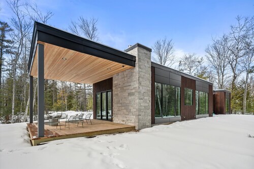 Cedar and Glass • Modern Forest Retreat in  Fish Creek