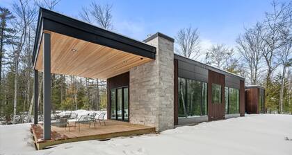Cedar and Glass • Modern Forest Retreat in Fish Creek