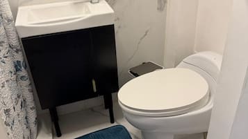 Hair dryer, towels, soap, toilet paper