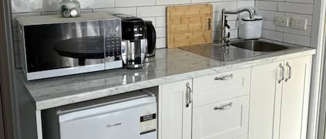 Fridge, microwave, electric kettle, toaster