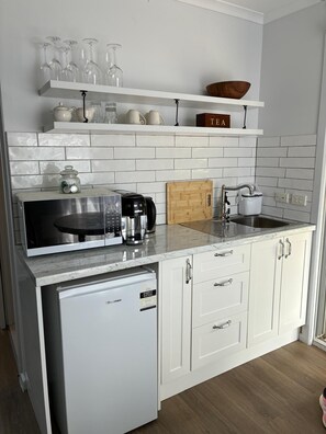 Fridge, microwave, electric kettle, toaster