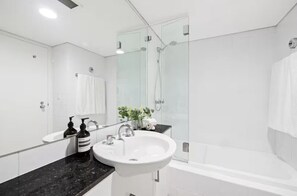 Hair dryer, towels, soap, shampoo