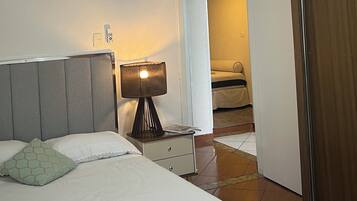 3 quartos, ferros/tábuas de passar roupa, Wi-Fi, roupa de cama